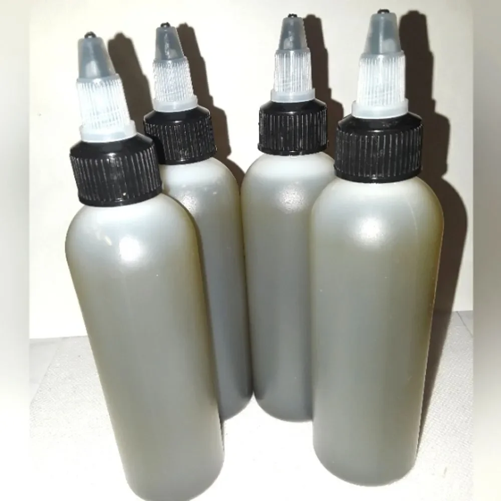 HAND crafted Neem and Amla hair and body oil